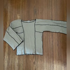 Brand new never worn Baserange contrast stitch shirt.